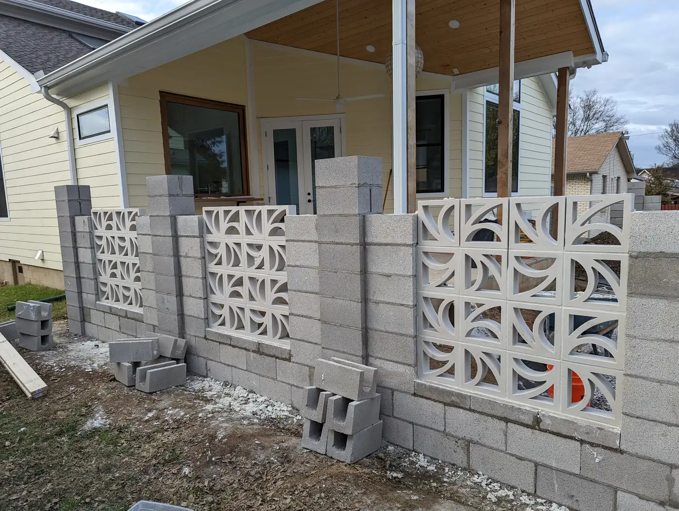 Decorative breeze block privacy wall built under a covered porch in Nashville, TN